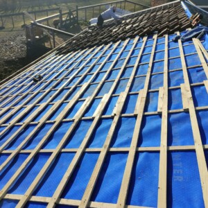 Dakdekker in de buurt van Amsterdam